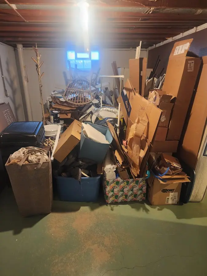 Roll-off dumpster container at job site for Concrete Dumpster Rental in Connersville